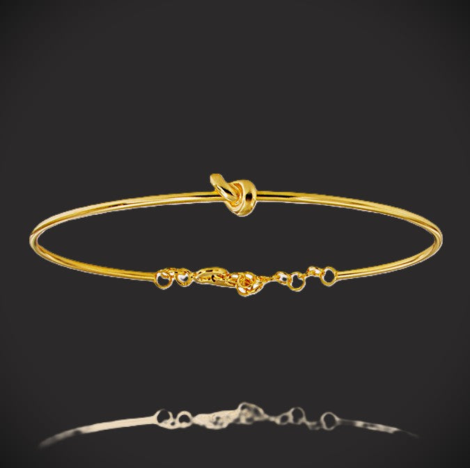 Slave bracelet with knot - gold plated